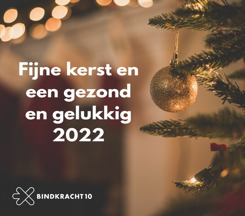 flyer met kerstwens Bindkracht10: fijne kers en een gezond en gelukkig 2022